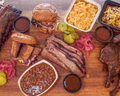 Smokin j's bbq - 3x2. For when you are a bit hungrier. 1/4 lb. Brisket, 1/4 lb. Pulled Pork, and 3 Wings tossed in the sauce of your choice, paired with your choice of 2 sides. Indulge and enjoy! $31.63. TV Dinner. Choose your Meat/Veg and get it paired with Bean Crack and Slaw. Classic BBQ served up in a TV dinner tray. $20.13.